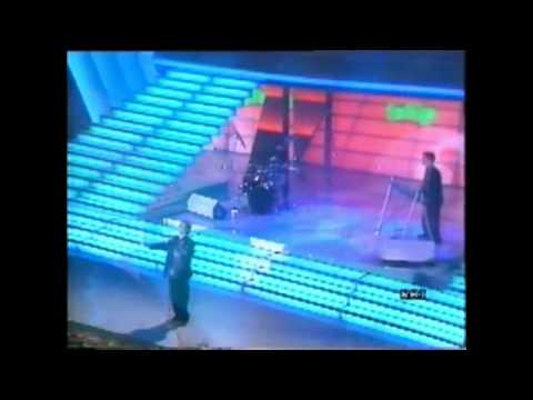 Immagine del video Dimmi che cos’è · Sanremo 1987